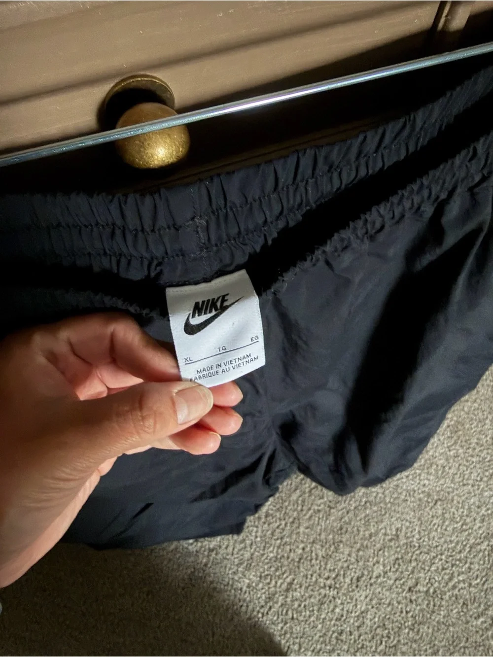 Nike Black Snap-Hem Joggers with White Swoosh